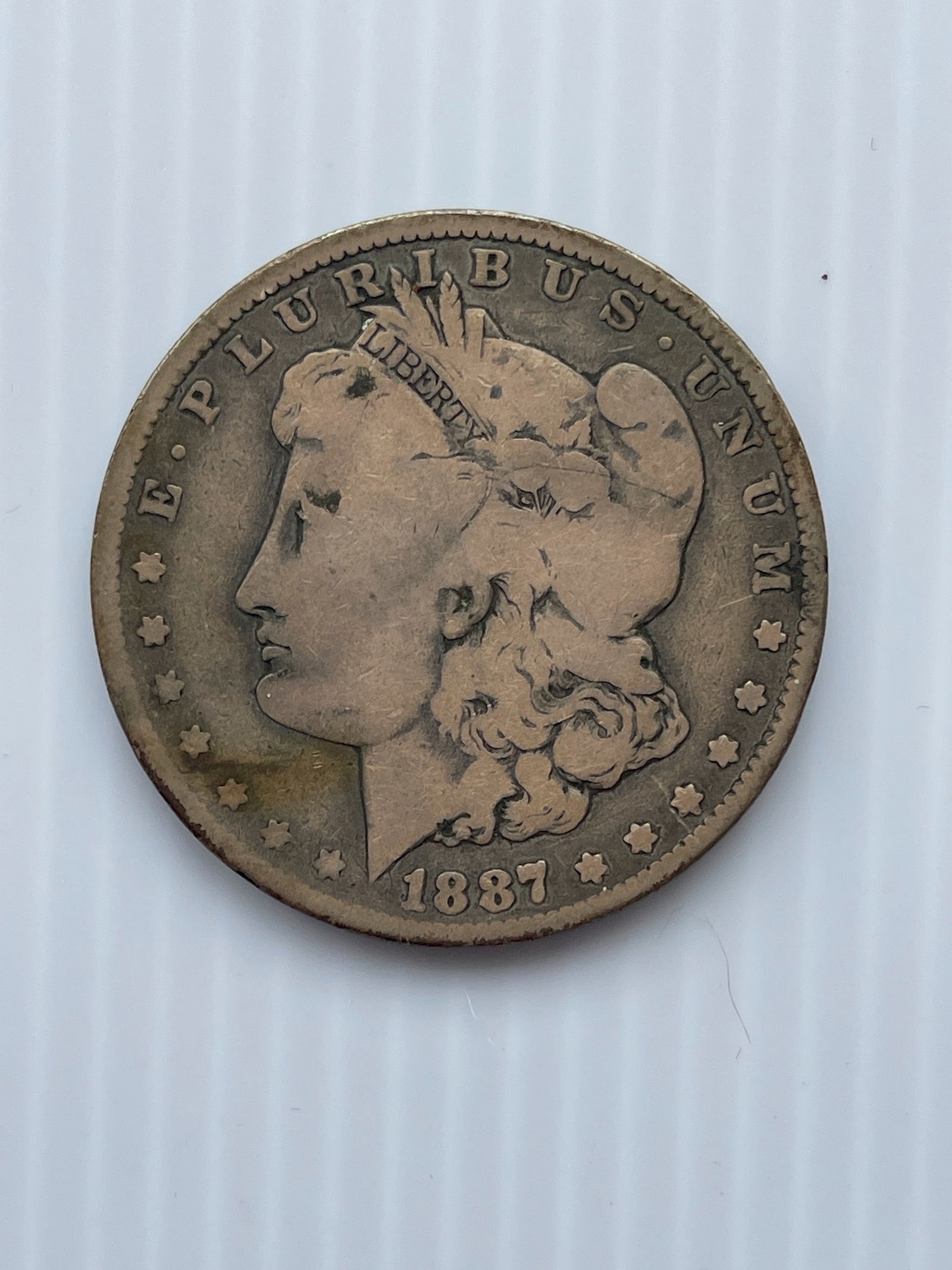 1887 SILVER DOLLAR (1 of 3)