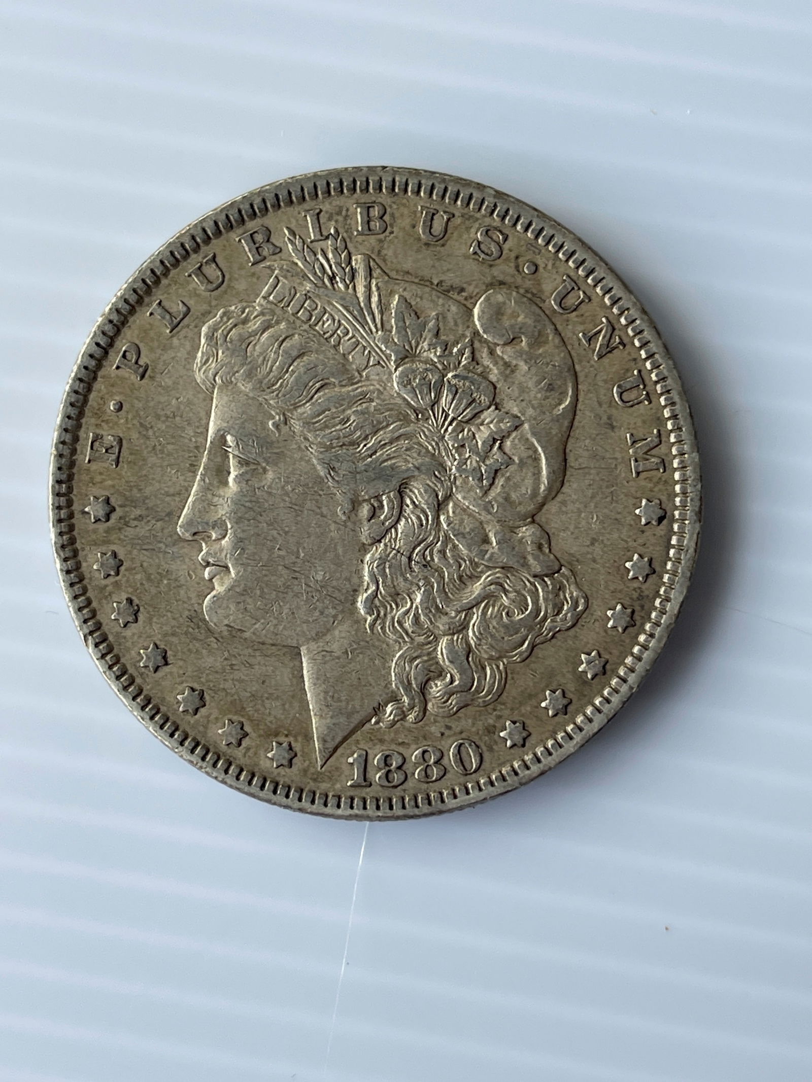 1880 SILVER DOLLAR (1 of 2)