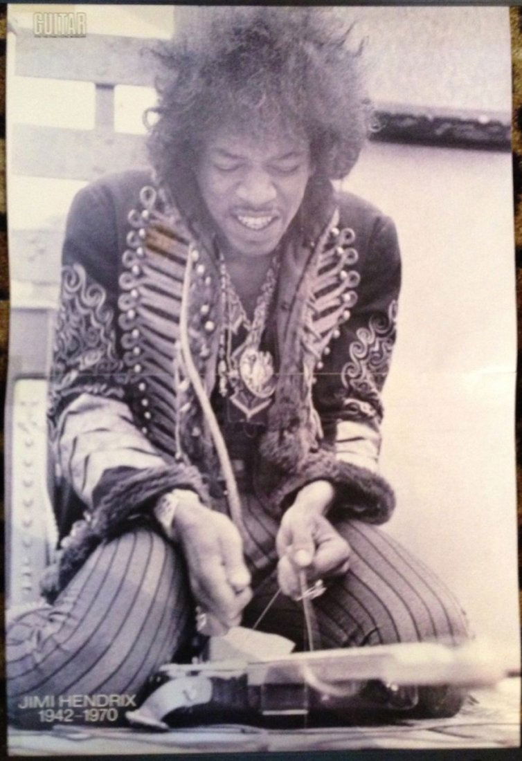 JIMI HENDRIX GUITAR MAGAZINE PULLOUT POSTER: JIMI HENDRIX GUITAR MAGAZINE PULLOUT POSTER honoring Jimi from Woodstock.