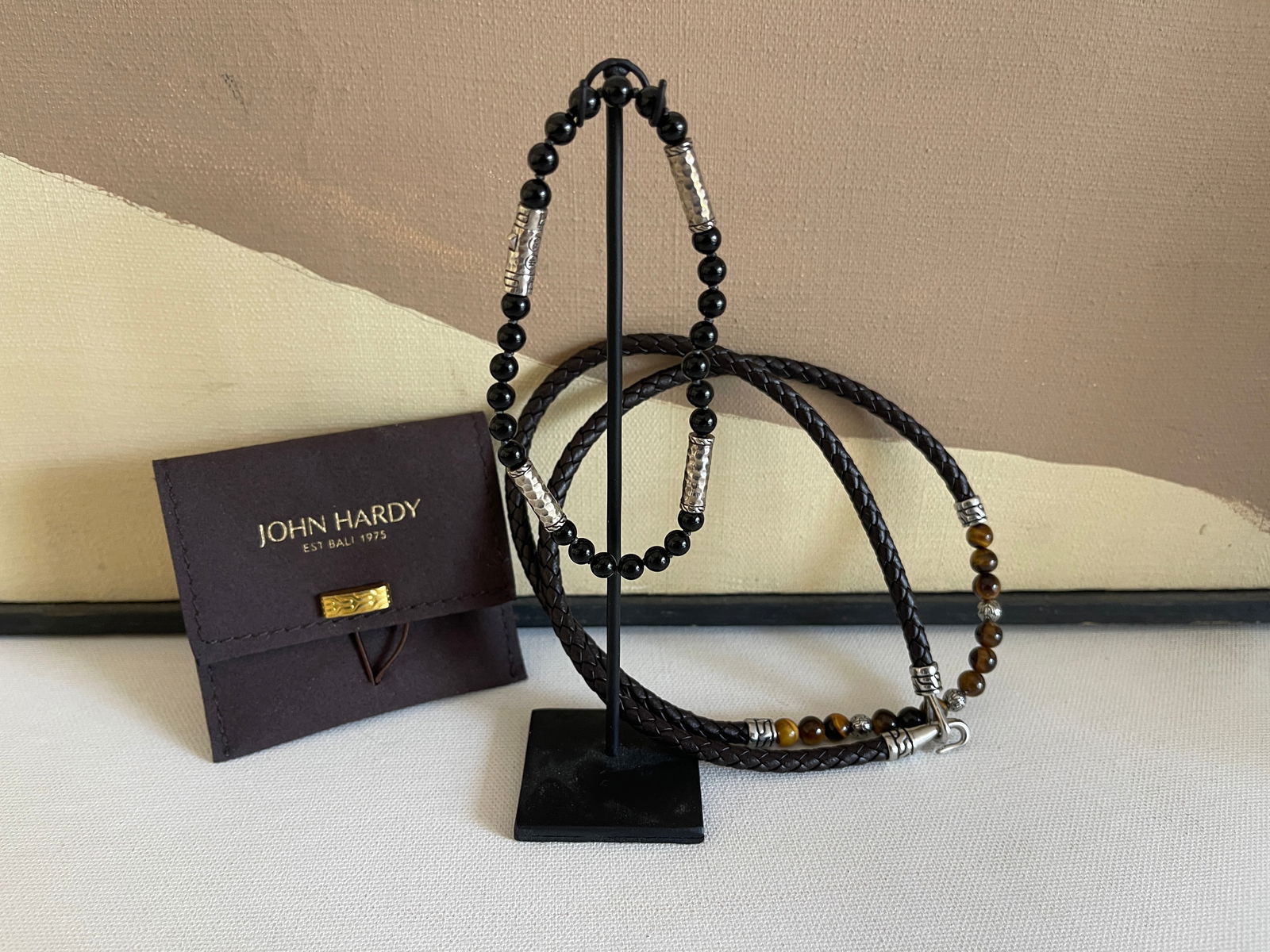 JOHN HARDY - JEAN CLAUDE BEADED NECKLACE AND BRACELET SET: JOHN HARDY BEADED BRACELET WITH 925 STERLING SILVER ADORNMENTS AND BLACK BEADS. ABOUT 8" LONG. NEW IN JOHN HARDY ORIGINAL POUCH. JEAN CLAUDE NECKLACE IS ABOUT 22 INCHES LONG WITH STERLING SILVER ADORN
