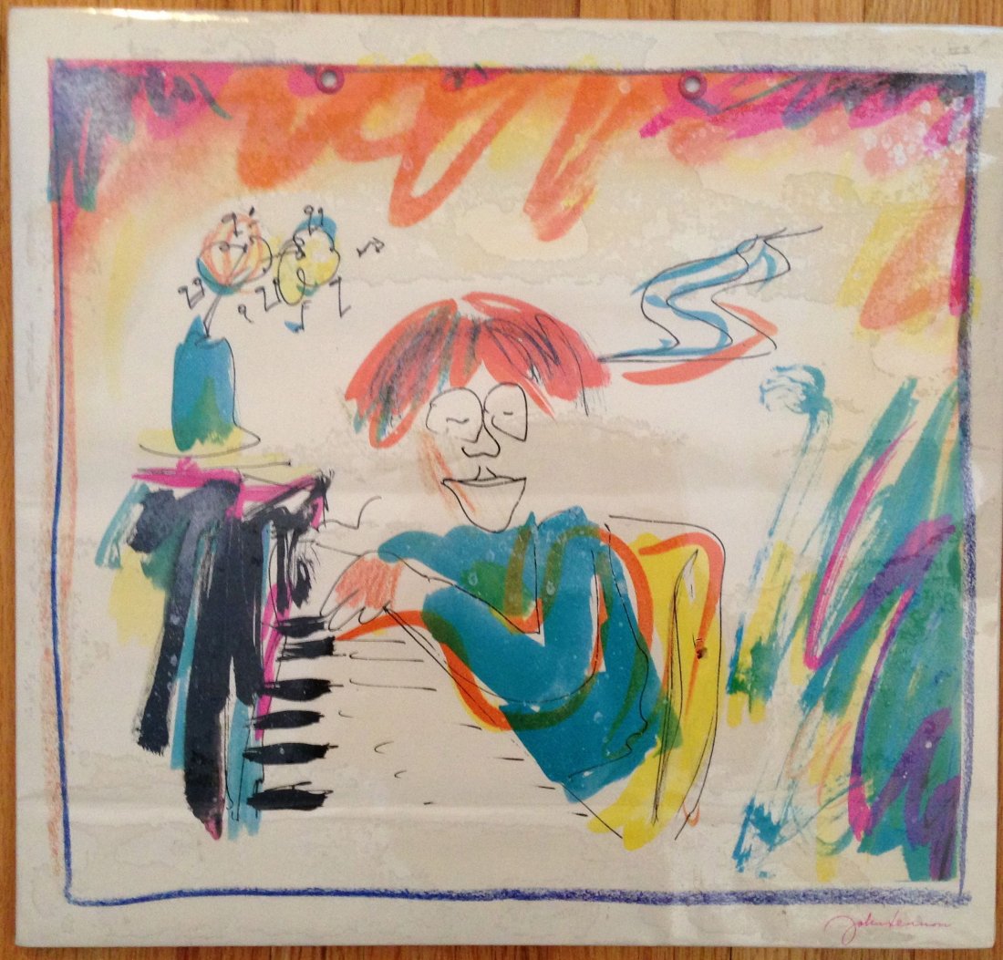JOHN LENNON ART PRINT - GRAND PIANO: A unique illustration print featuring a John Lennon colored drawing. Signed (on print) in red with John's signature. This print is called "GRAND PIANO" or sometimes also called BABY GRAND 1974. This i