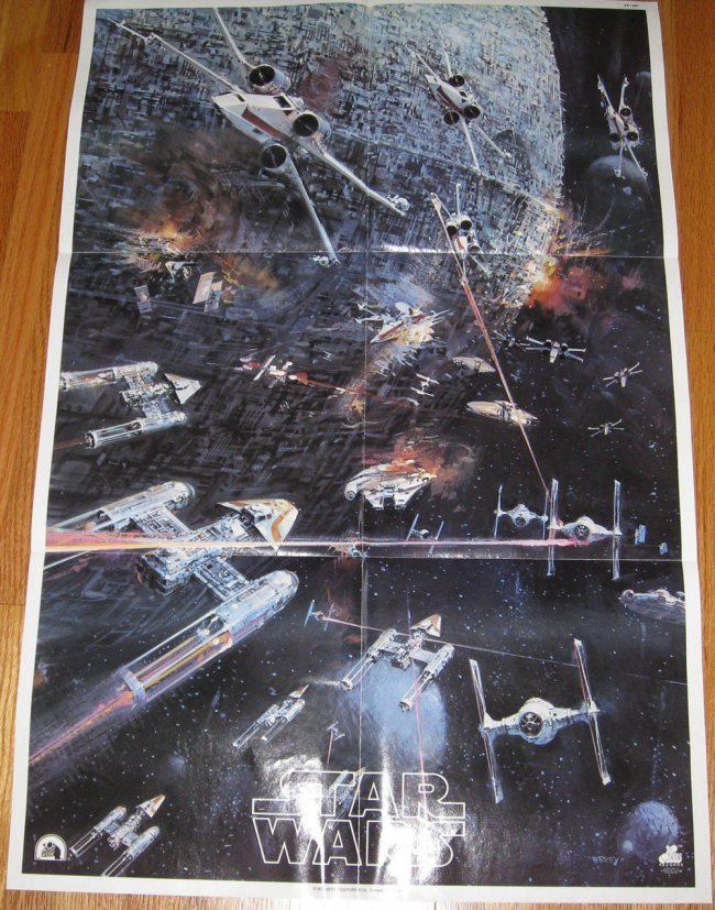 STAR WARS 1977 MOVIE POSTER - VINTAGE ORIGINAL: Vintage 1977 Star Wars Poster 2T-541 The poster measures 22"(W) x 33"(H). It is machine folded into 6 panels that measure 11" x 11". The poster depicts a space battle between Rebel and Imperial Forces