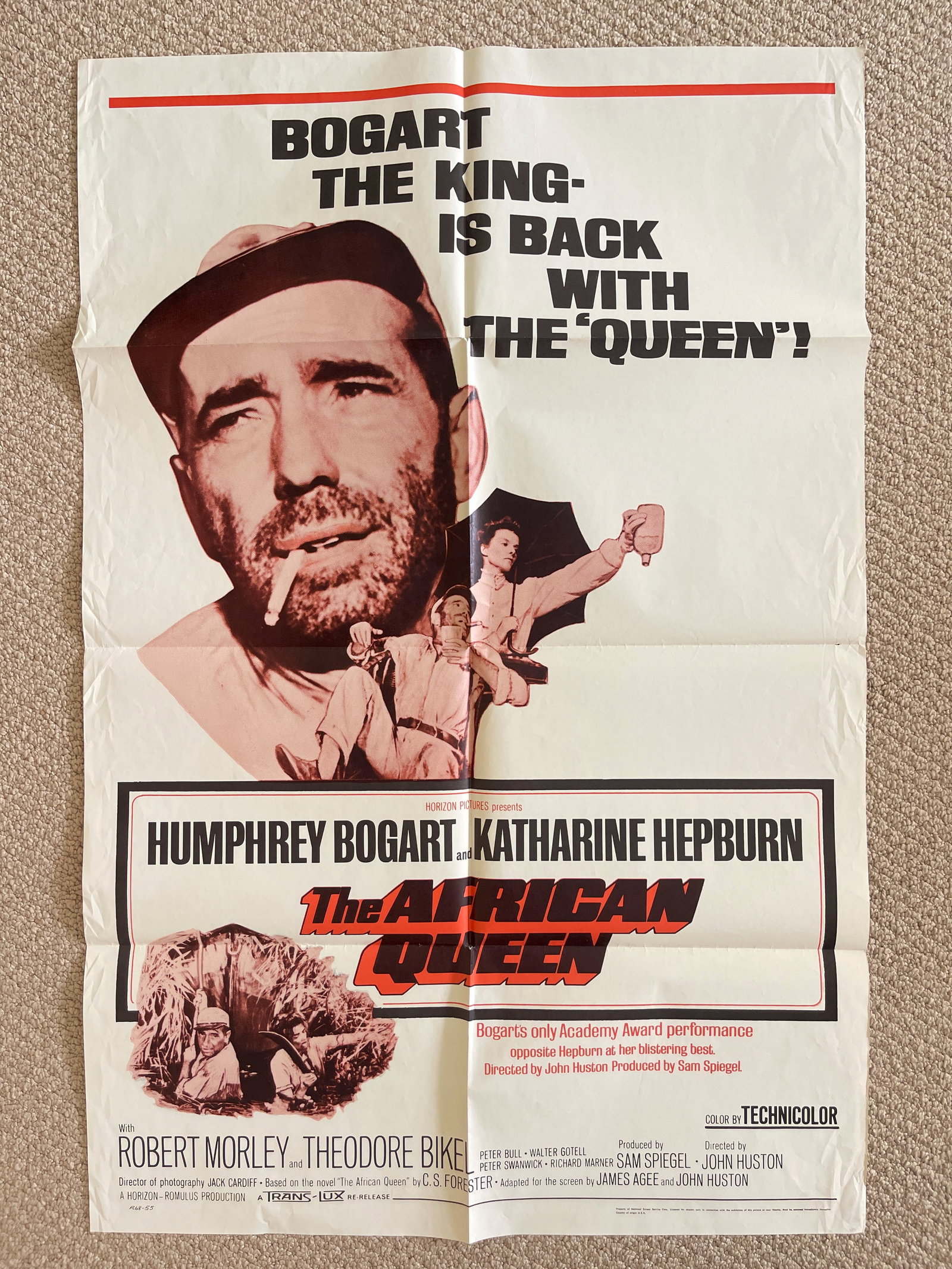THE AFRICAN QUEEN - BOGART HEPBURN MOVIE POSTER: THE AFRICAN QUEEN - BOGART HEPBURN ONE-SHEET ORIGINAL MOVIE POSTER. FO LDED AS DISTRIBUTED. EDGE WEAR.