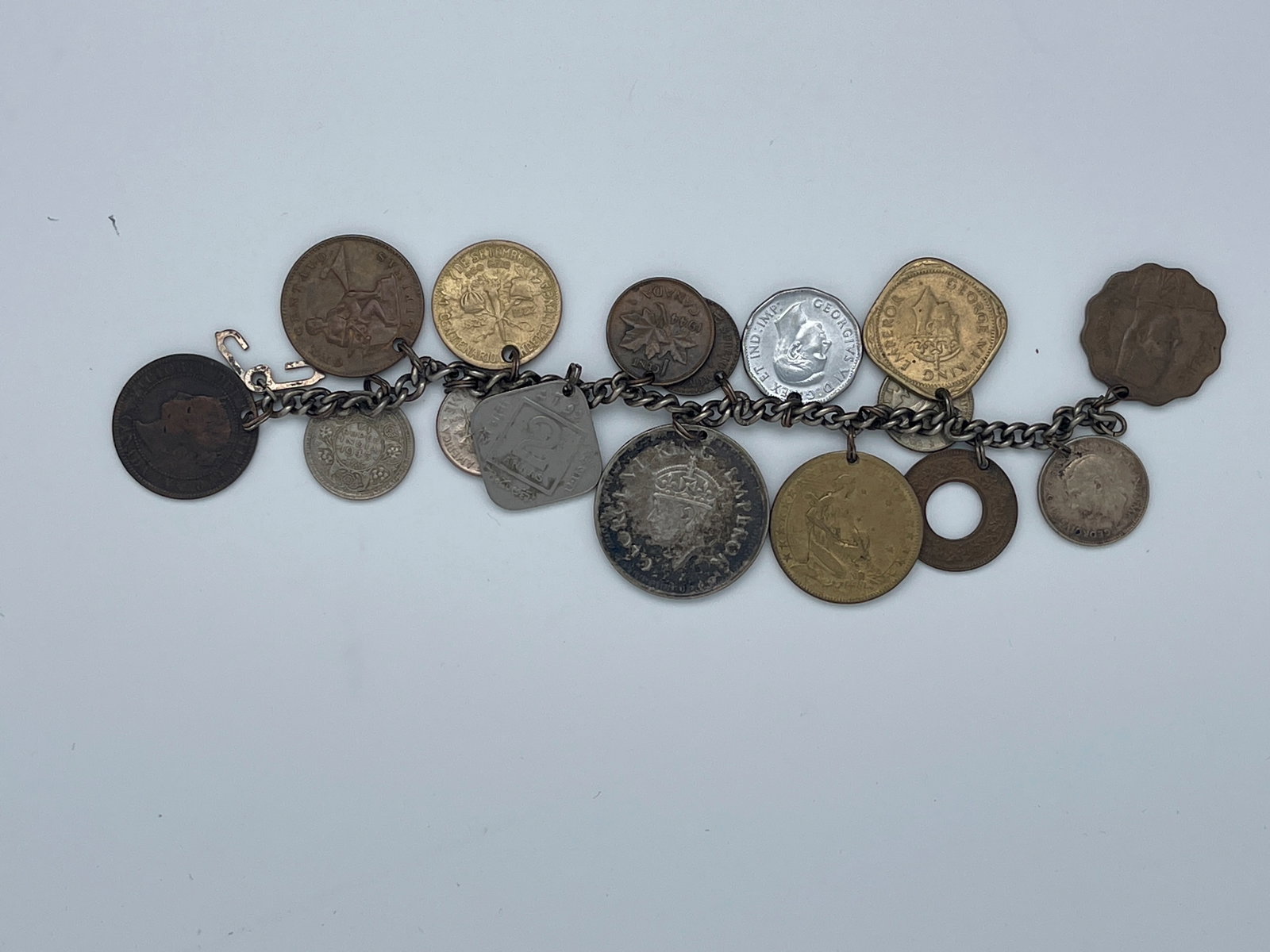 COINS OF THE WORLD BRACELET: COINS OF THE WORLD BRACELET