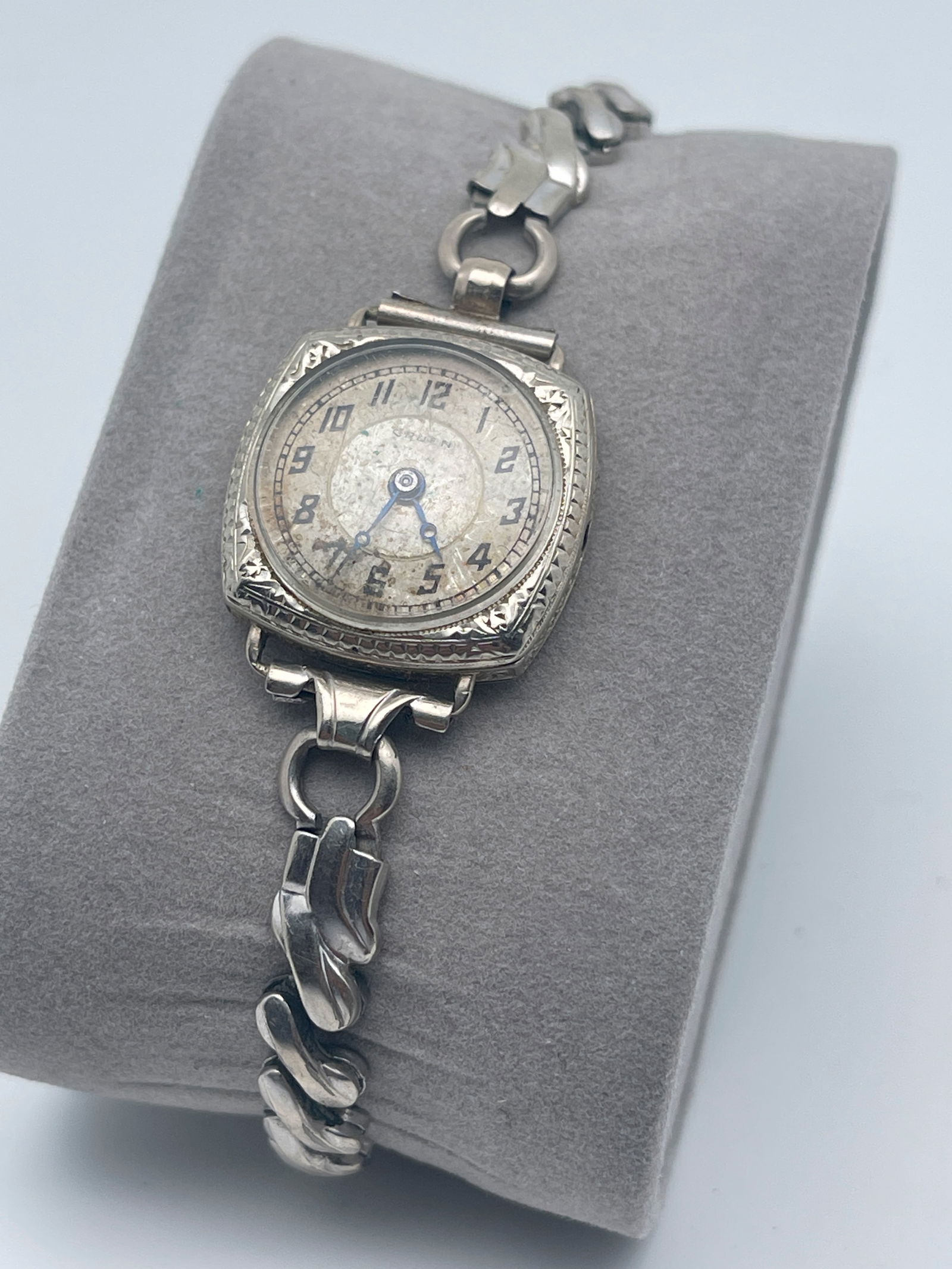 GRUEN WOMENS ART DECO WATCH: GRUEN WOMENS ART DECO WATCH. MISSING CROWN. CHAMPION STRETCH BAND. NO MARKINGS ON BACK. CANNOT TEST HANDS OR MOVEMENT. UNTESTED SOLD AS IS. NO TICKING SOUND.
