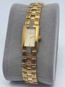BEAUTIFUL BOLOVA WOMENS GOLD AND DIAMOND WATCH