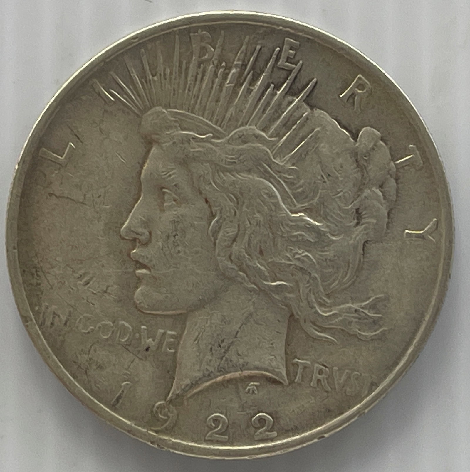 1922-S PEACE DOLLAR - MV $26: 1922-S PEACE DOLLAR. $32 VALUE. $26 MELT VALUE.