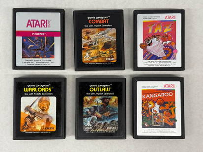 SET OF FOUR (6) ATARI VARIOUS GAME CARTS: SET OF FOUR (6) ATARI VARIOUS GAME CARTS WITH PHOENIX. COMBAT. TAZ. WARLORDS. OUTLAW. KANGAROO.