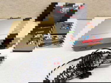 HISTORIC NINTENDO NES-001 WITH GAMES AND CONTROLLERS