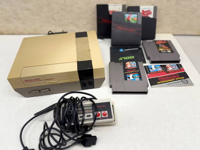 HISTORIC NINTENDO NES-001 WITH GAMES AND CONTROLLERS: HISTORIC NINTENDO NES-001 WITH GAMES AND CONTROLLERS. PLUGS IN POWERS ON UNTESTED. GAMES INCLUDE MARIO BROS. ! WITH ORIGINAL TRAVEL CASE AND CONTROLLERS.