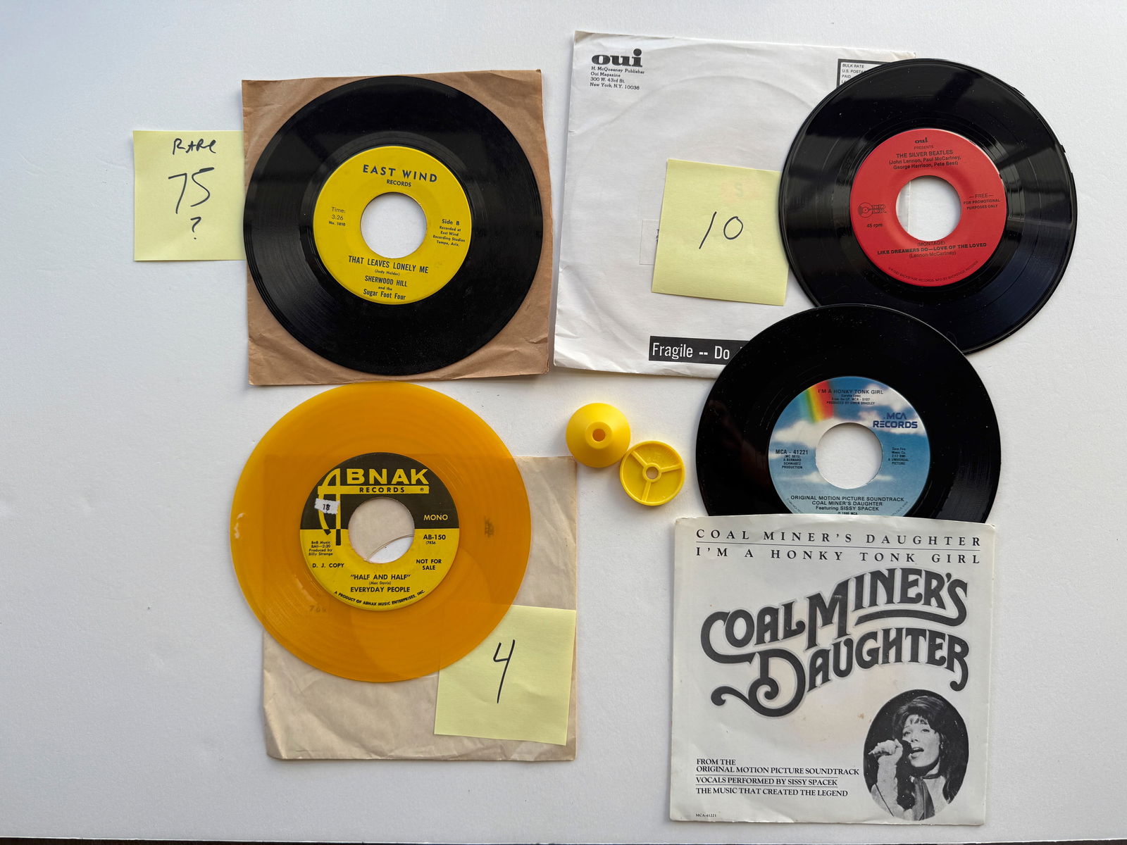 RARITIES: SHERWOOD HILL THAT LEAVES ONLY ME. OUI MAGAZINE THE SILVER BEATLES IN ORIGINAL PACKAGING. HALF AND HALF BY MAC DAVIS - AS SUNG BY EVERYDAY PEOPLE ON YELLOW VINYL. COAL MINERS DAUGHTER. PLUS TWO 45RPM