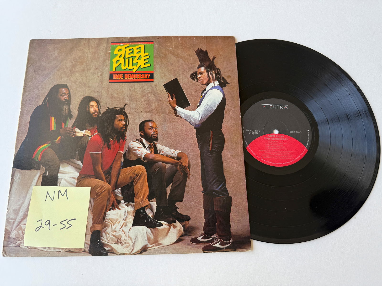 Steel Pulse - True Democracy: Steel Pulse - True Democracy. Elektra - E1-60113. Roots Reggae. Roots reggae band, formed in 1975 at Handsworth Wood Boys School, in Birmingham, England, by David Hinds (lead vocals, guitar), Basil Ga