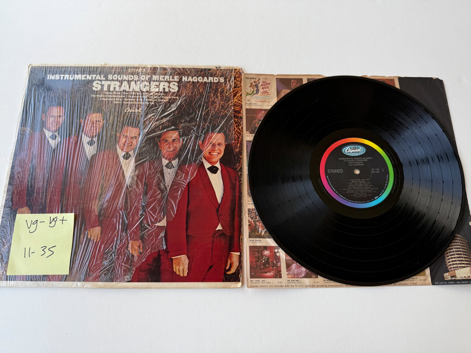 The Strangers - The Instrumental Sounds Of Merle Haggard's Strangers: The Strangers - The Instrumental Sounds Of Merle Haggard's Strangers. Capitol Records - ST 169. Pop, Folk, World, & Country. Merle Haggard's band. Retail plastic still on cover. 1969.