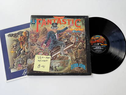 Elton John - Captain Fantastic And The Brown Dirt Cowboy: Elton John - Captain Fantastic And The Brown Dirt Cowboy. MCA Records - MCA-2142. With "Lyrics" book