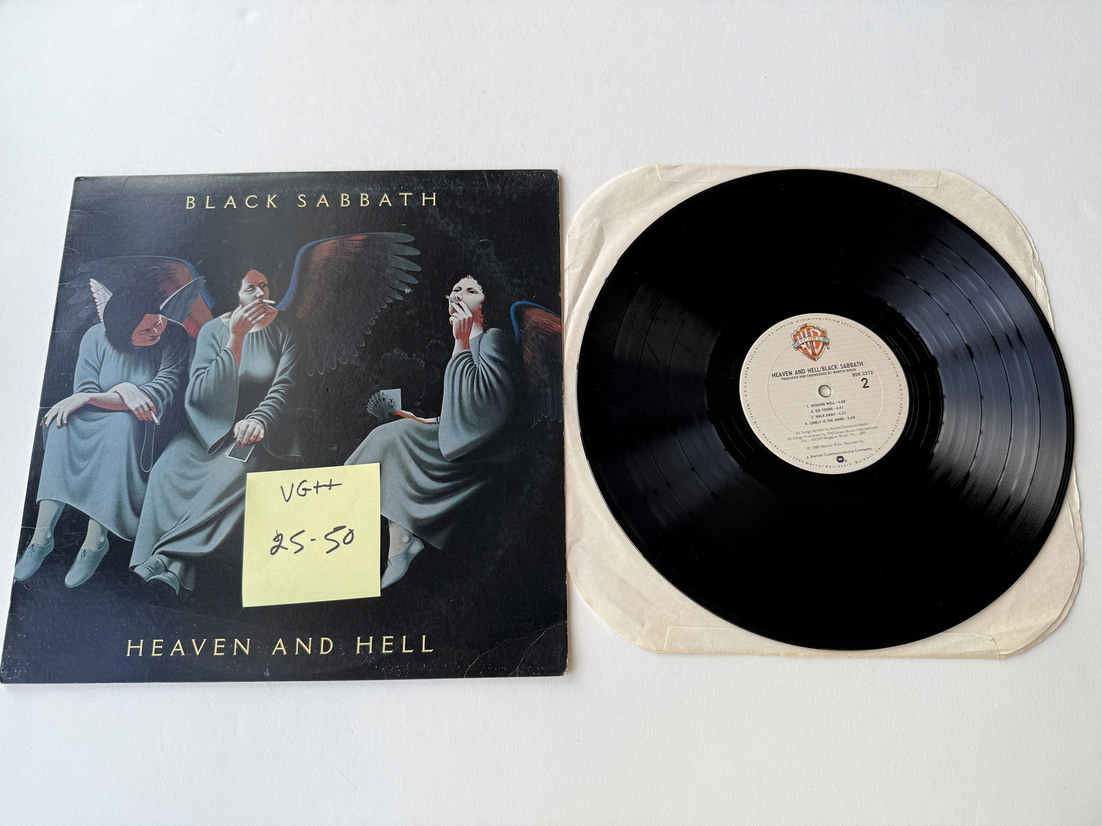 Black Sabbath - Heaven And Hell: Black Sabbath - Heaven And Hell. Matrix: BSK2-3372-1C T. Warner Bros. Records - BSK 3372. "The world is full of Kings and Queens. Who blind your eyes, then steal your dreams. It's Heaven and Hell!"
