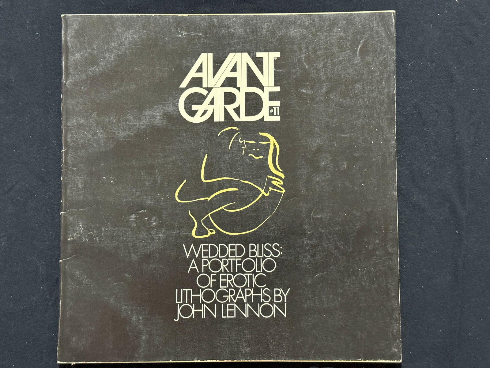 AVANT GARDE #11 - JOHN LENNON: Avant Garde #11 is the March 1970 issue of the counter-culture magazine, famous for featuring John Lennon's portfolio of erotic lithographs titled "Wedded Bliss". Edited by Ralph Ginzburg, this issue
