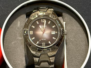 RELIC BRAND STAINLESS STEEL WATCH IN ORIGINAL CAN