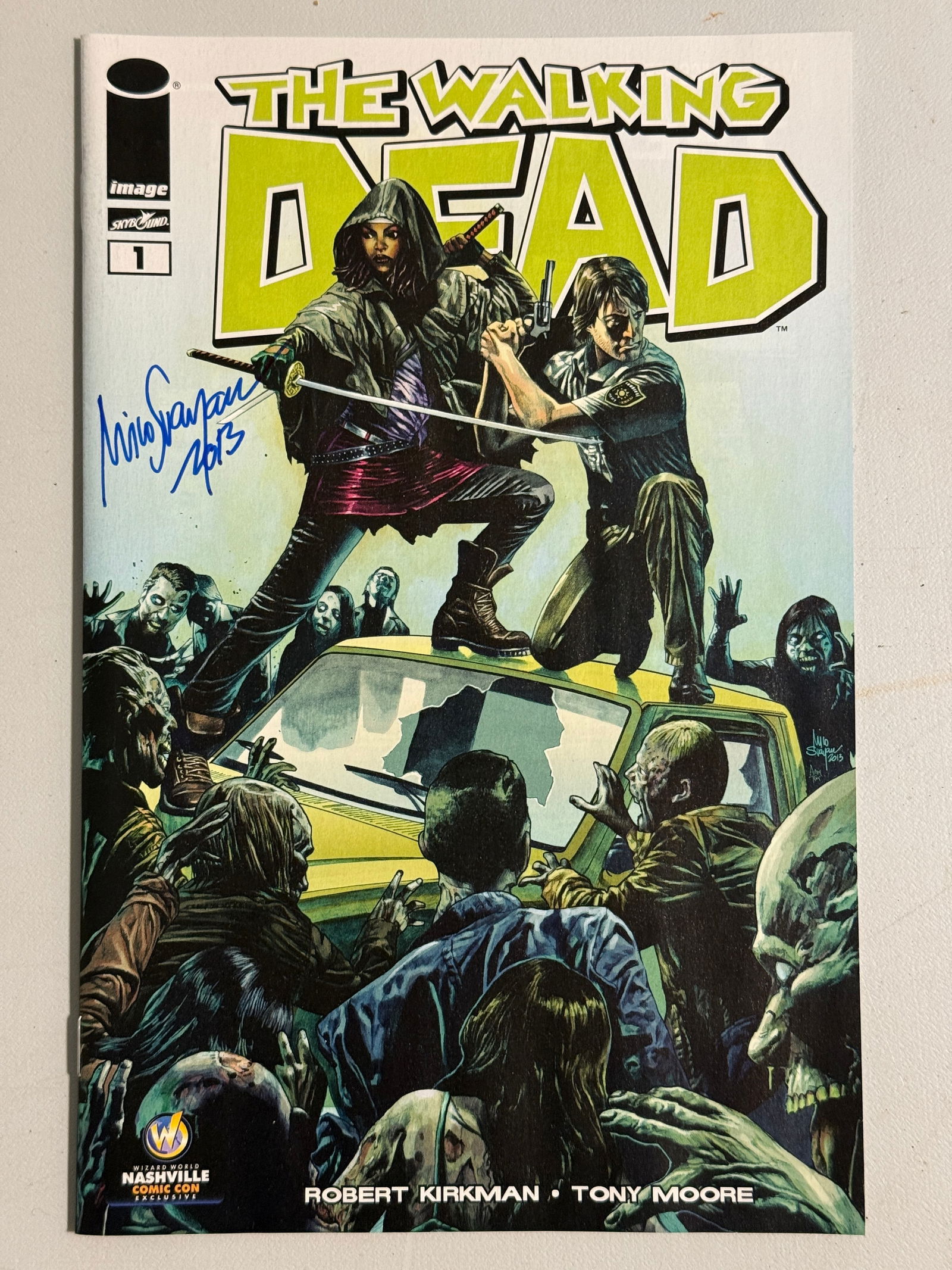 SIGNED - RARE - WALKING DEAD #1 - signed by cover artist (1 of 3)