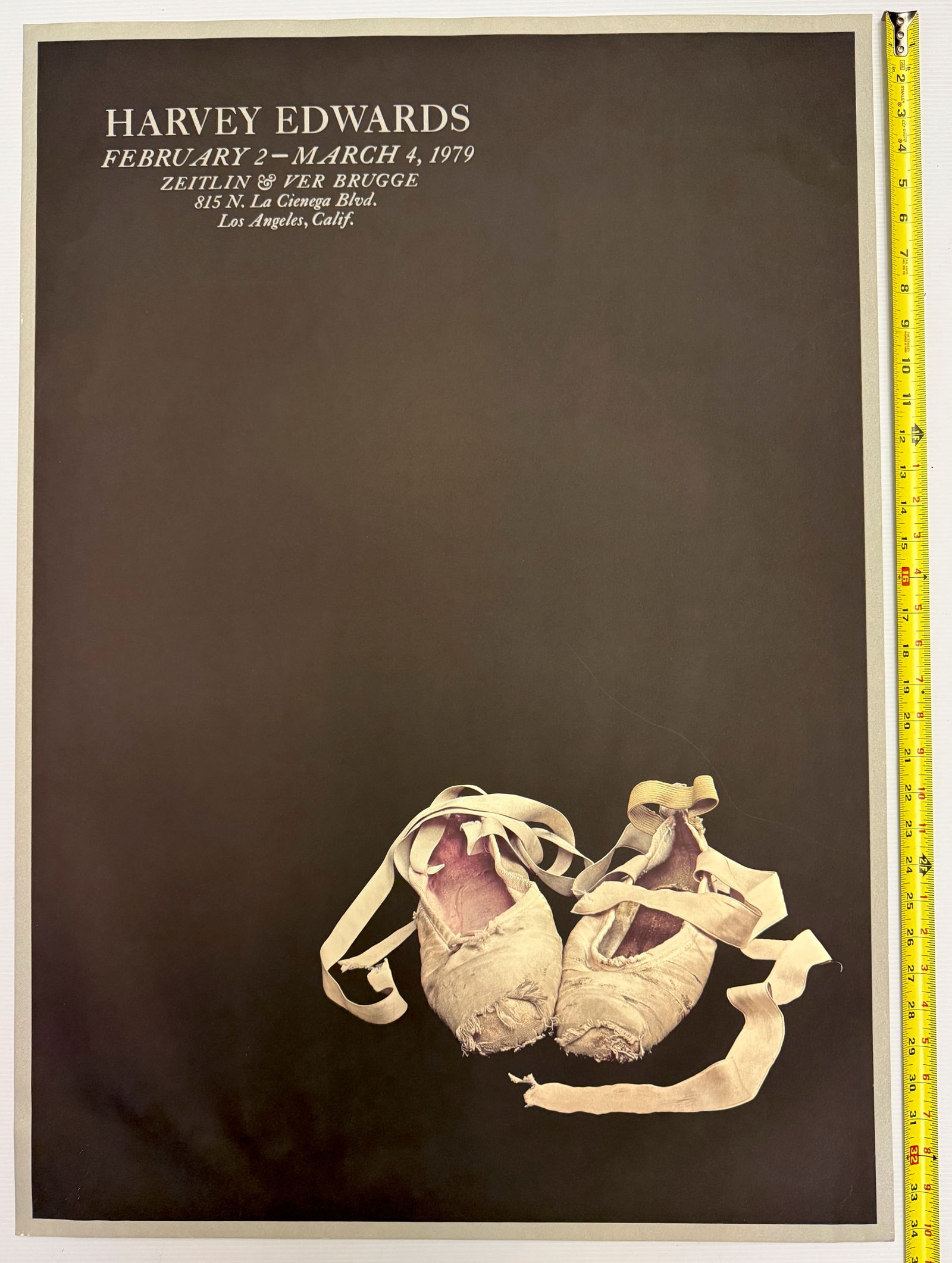 Harvey Edwards - Ballet Slippers: This image is a vintage exhibition poster for photographer Harvey Edwards, featuring his famous photograph titled "Ballet Slippers". Poster Details: about 22 x 34 with slight water creasing in bottom