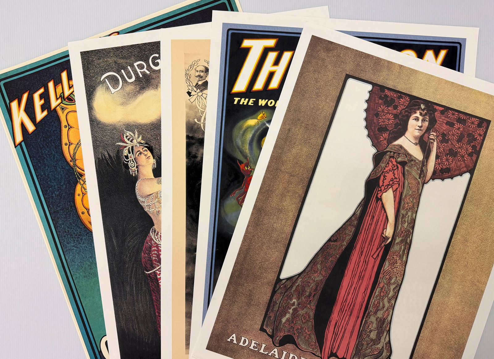 AMAZING SET OF 6 MAGICIAN RELATED REPRINTS: AMAZING SET OF 6 MAGICIAN RELATED REPRINTS.. EACH ABOUT 14 X 24. SCREEN PRINTS AND LITHOS. AMAZING COLLECTION - HIGHLIGHTED BY The a vintage reprint poster advertising a magic show illusion by the