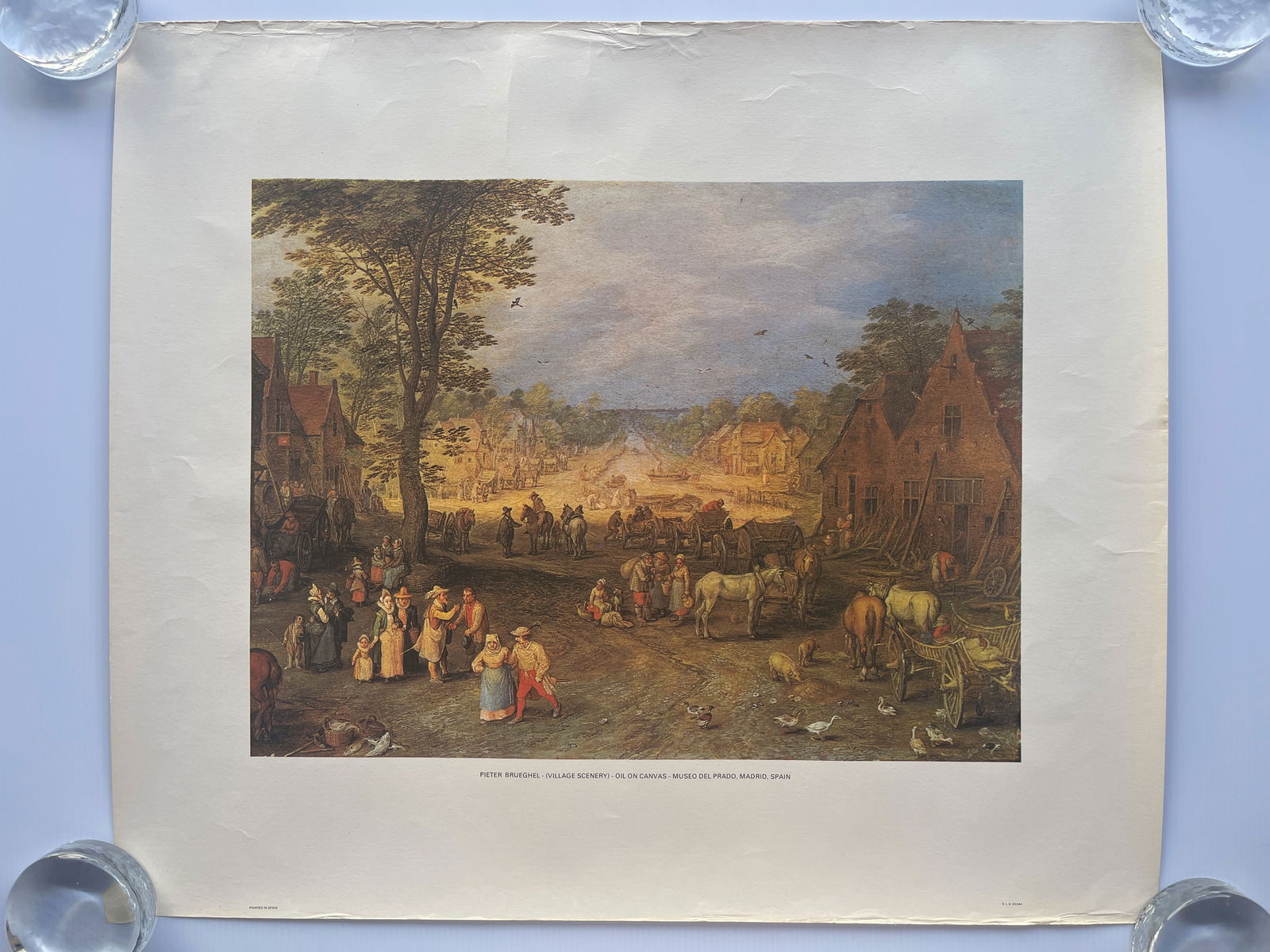 Village Scene with a Canal - Jan Brueghel the Elder: The image provided is a litho of the painting titled Village Scenery (also known as Village Scene with a Canal or Belebter Dorfplatz) by the Flemish artist Jan Brueghel the Elder. The original paintin