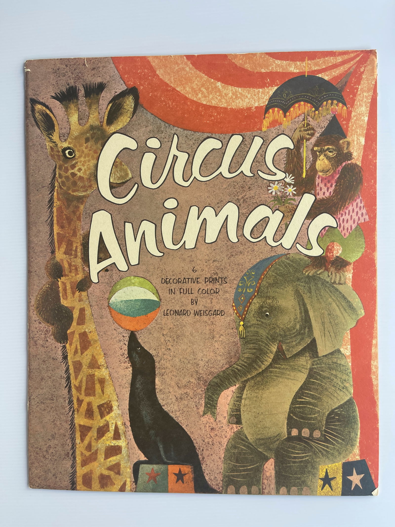 Circus Animals Portfolio - 6 prints - Leonard Weisgard - 1958: The image is a cover for a portfolio of six decorative prints titled "Circus Animals" by artist Leonard Weisgard. These prints were published by Penn Prints, New York, in 1958. Details Artist: Leonard