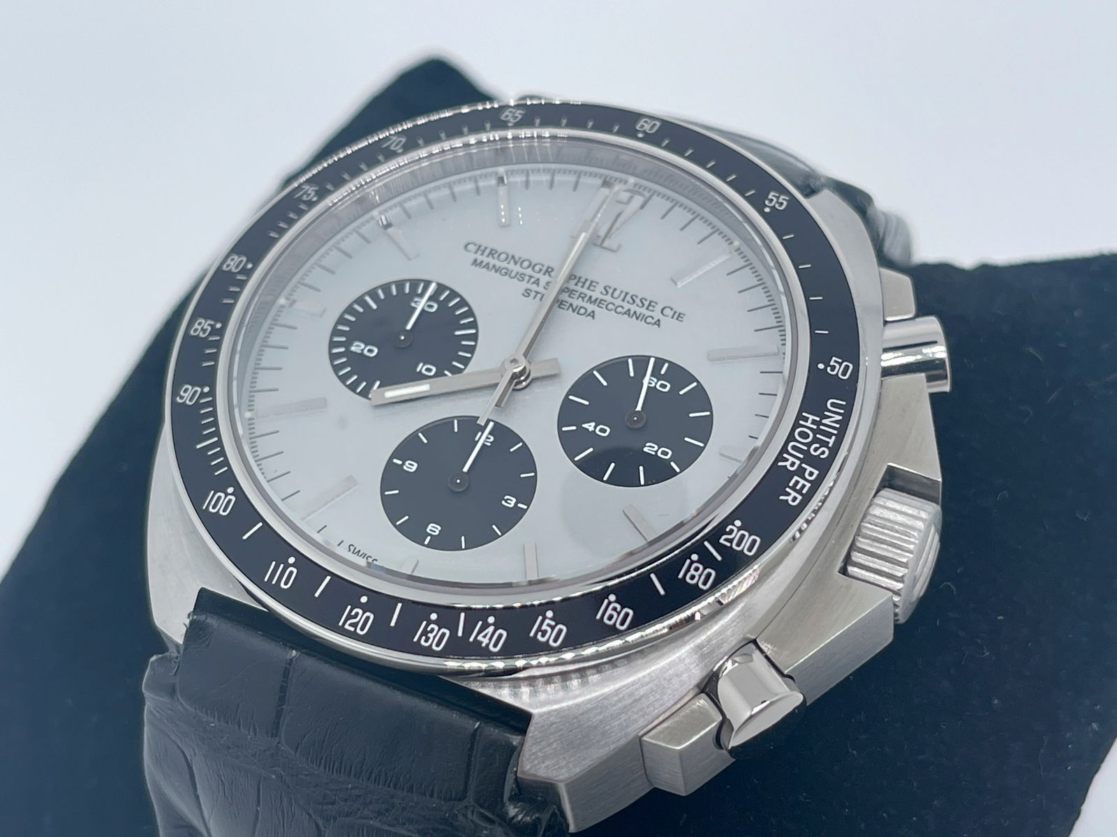 Chronographe Suisse Mangusta Supermeccanica Stupenda.: Chronographe Suisse Mangusta Supermeccanica Stupenda.RARE. powered by an automatic movement inside of a 46mm stainless steel case with interior rotating bezel. The white dial features luminescent