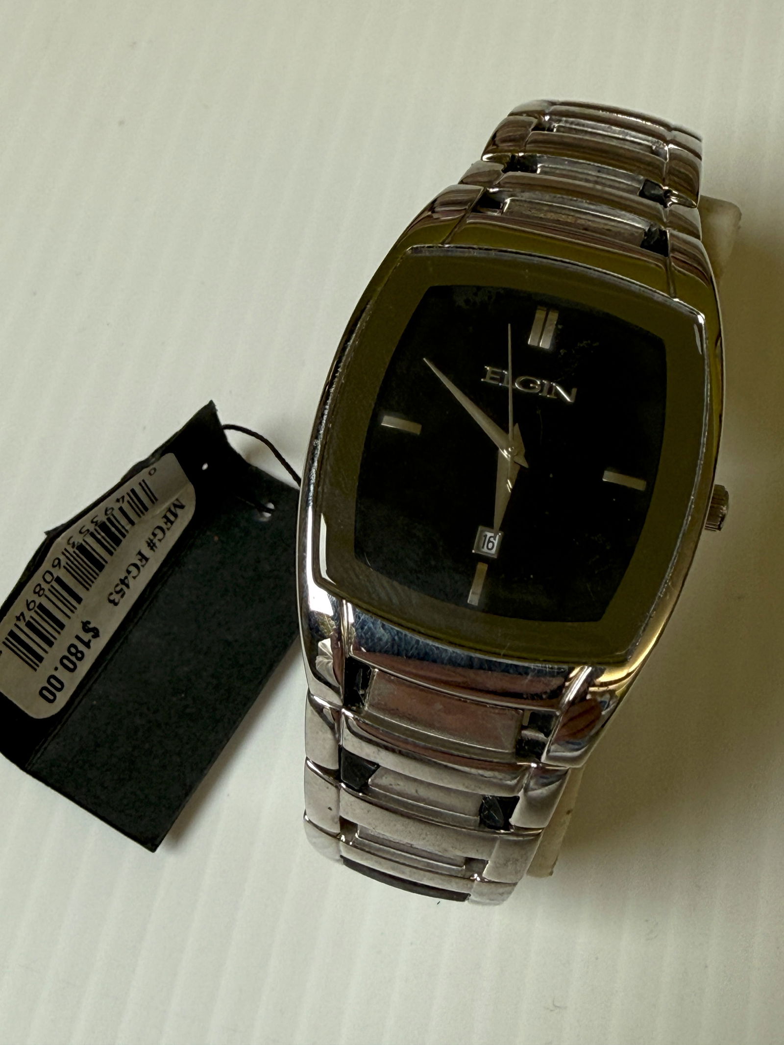 ELGIN FG453 WATCH 100FT WATER RESISTANT ALL STAINLESS STEEL VINTAGE: ELGIN FG 453 097 IN12 WATCH 100FT WATER RESISTANT ALL STAINLESS STEEL VINTAGE. NEW OLD STOCK. great condition, Original elgin band.