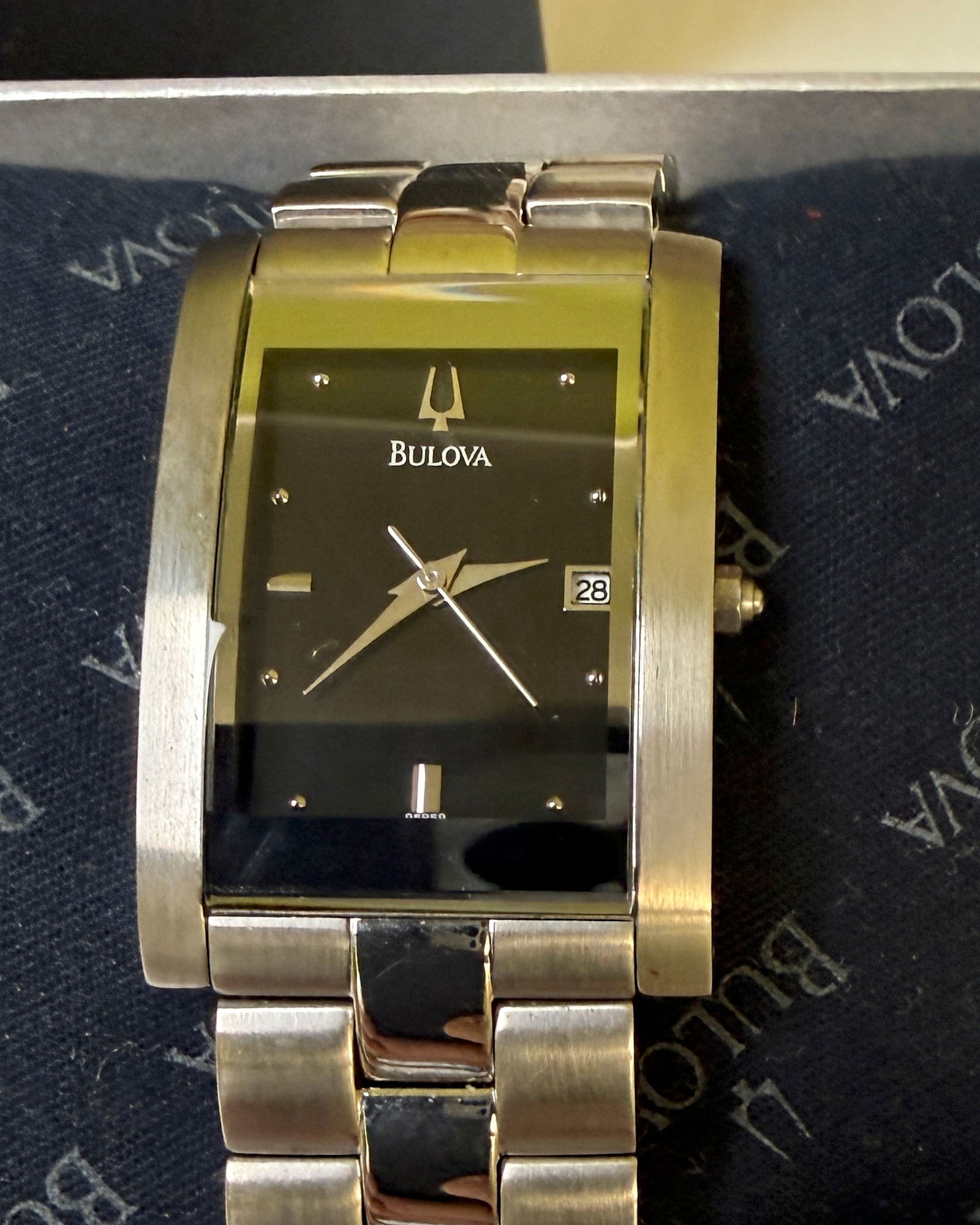 Rare Bulova 96B59 Silver Dial Blue Hands Quartz Men's Dress Watch: Rare Bulova 96B59 Silver Dial Blue Hands Quartz Men's Dress Watch - NEW OLD STOCK. Brand: Bulova. Model: 96B59Condition: NOS (New Old Stock) - Brand new, never worn. With Box.Movement: High-Quality Qu