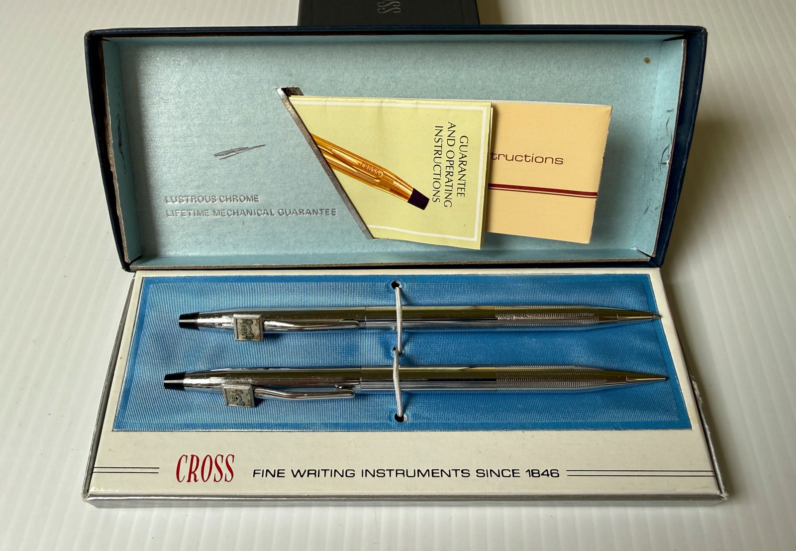 CROSS PEN AND PENCIL SET: CROSS PEN AND PENCIL SET. Set has carriage symbol engraved.