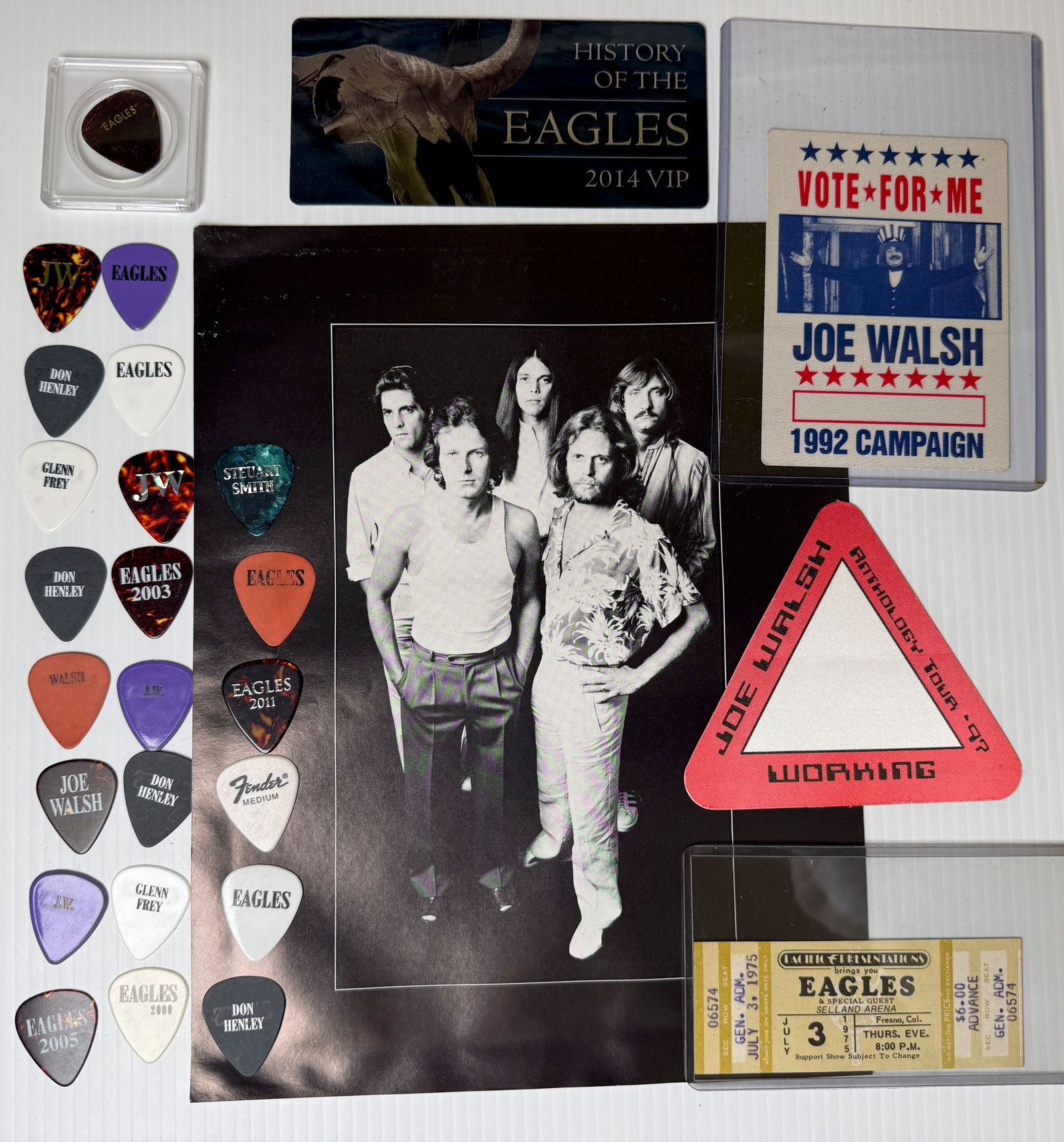 FANTASTIC EAGLES PICK, TICKET AND PASS SET: FANTASTIC EAGLES PICK, TICKET AND PASS SET. RARE ITEMS. 2232 GUITAR PICKS. 1975 TICKET STUB. JOE WALSH WORKING CREW PAS 1997. VOTE FOR JOE WALSH PASS 1992. 2014 EAGLES VIP HARD PLASTIC TICKET.
