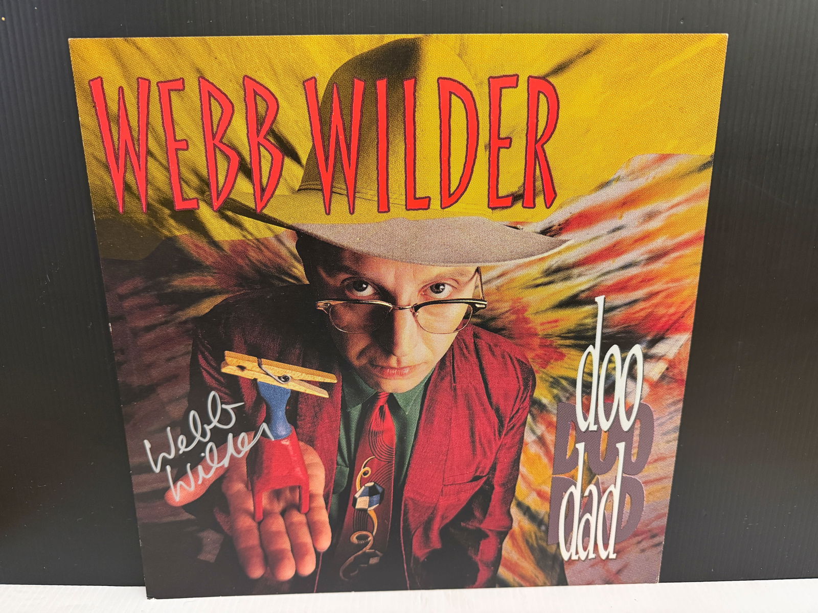 WEBB WILDER SIGNED POSTER: WEBB WILDER SIGNED POSTER - DOO DAD. John Webb McMurry. - Progressive country/roots rock musician. Originally from Hattiesburg, Mississippi, now based in Tennessee. After playing in the rock band The