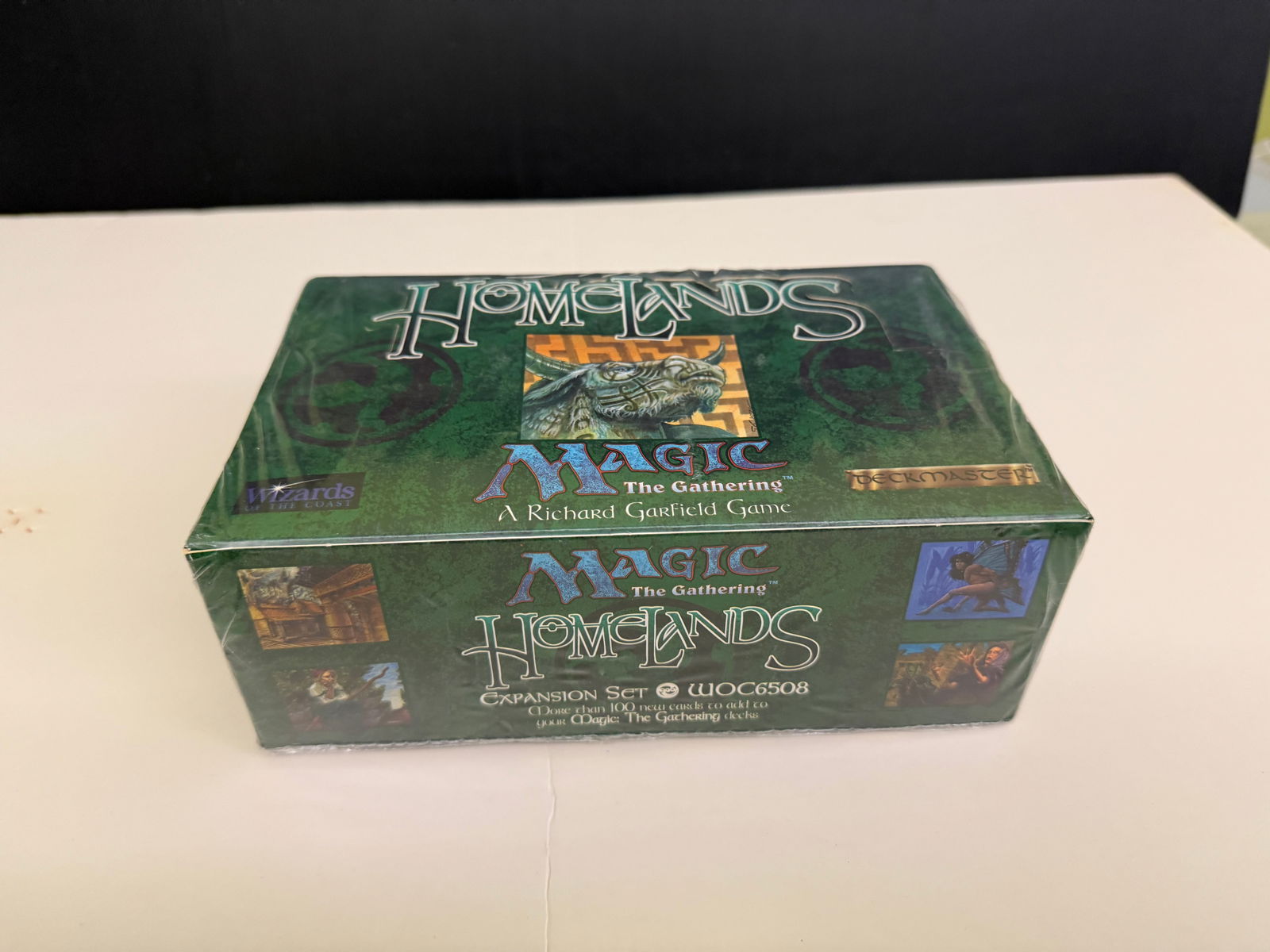 FACTORY SEALED MAGIC THE GATHERING HOMELANDS EXPANSION BOX: FACTORY SEALED MAGIC THE GATHERING HOMELANDS EXPANSION BOX. FACTORY SEALED MAGIC THE GATHERING HOMELANDS EXPANSION BOX. ISBN 1-880992-36-1. green box. sealed. pictures to come.