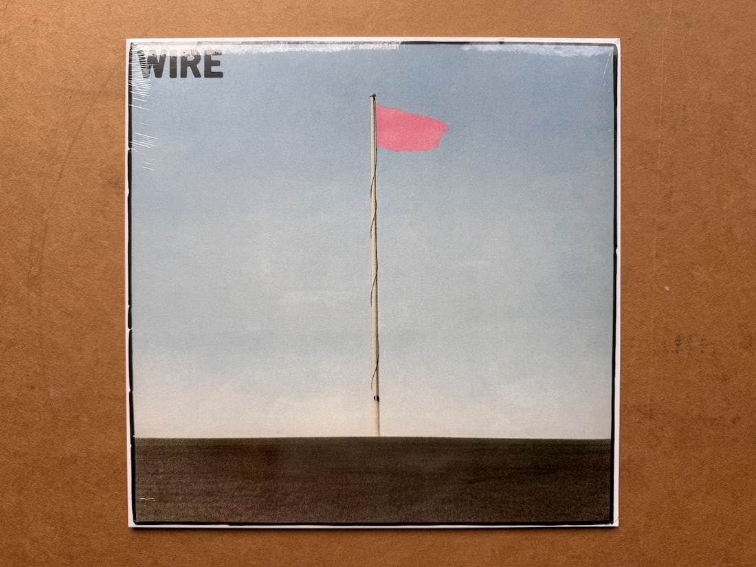 Wire - Pink Flag - SEALED: Wire - Pink Flag - SEALED. Wire is an English rock band, formed in London in October 1976 by Colin Newman (vocals, guitar), Graham Lewis (bass, vocals), Bruce Gilbert (guitar), and Robert Gotobed