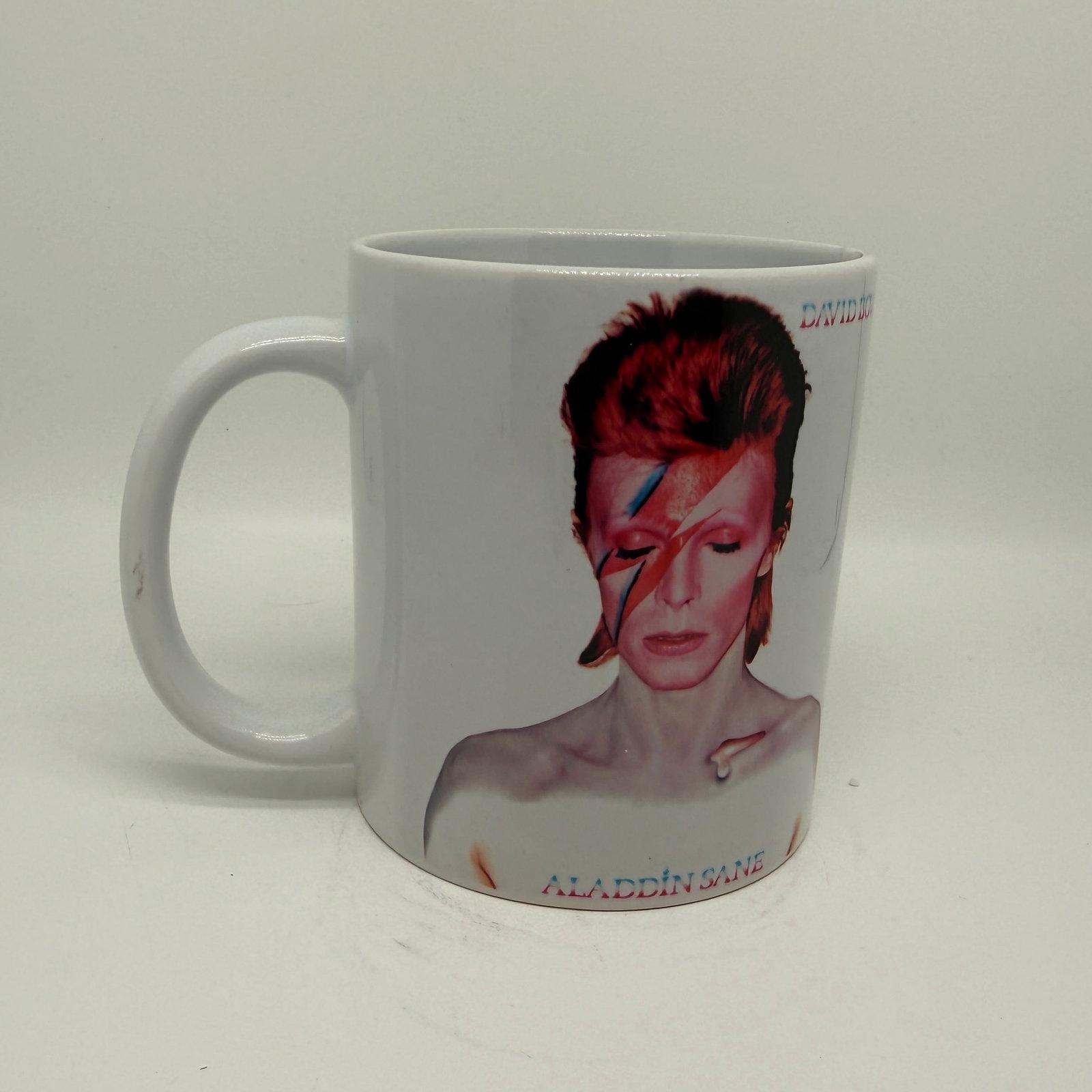 DAVID BOWIE ALADDIN SANE 11OZ COFFEE MUG: DAVID BOWIE ALADDIN SANE 11OZ COFFEE MUG