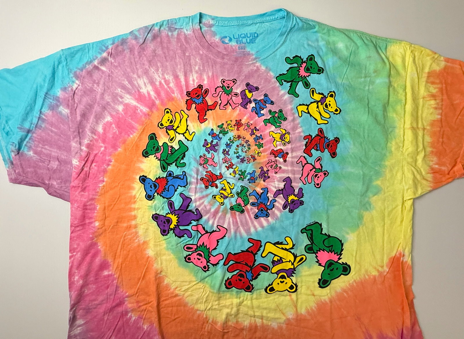 GRATEFUL DEAD LIQUID BLUE T-SHIRT - DANCING BEARS: GRATEFUL DEAD LIQUID BLUE T-SHIRT - DANCING BEARS. NEVER WORN. NIGHT SHIRT. SIZE 6XL. 1995 GDM / GDP. BACK OF SHIRT DISPLAYS CIRCULAR TIE-DYE PATTERN.