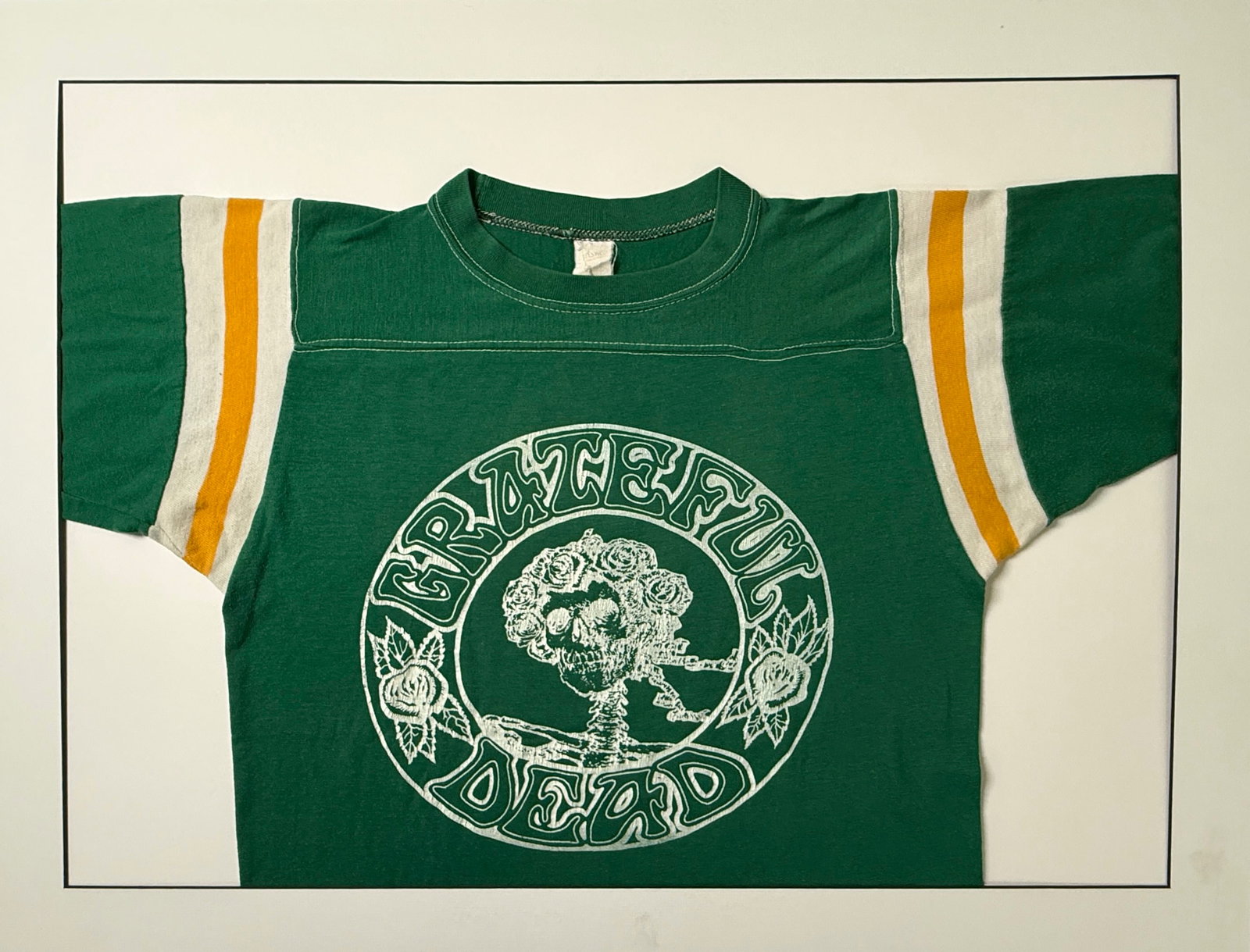 GRATEFUL DEAD VINTAGE 1979 JERSEY: GRATEFUL DEAD VINTAGE 1979 LARGE SHORT SLEEVE JERSEY FROM SPARTAN STADIUM SHOW. The green shirt is Brett Mydland’s first show with the band (keyboardist) at Spartan Stadium in San Jose CA, and the