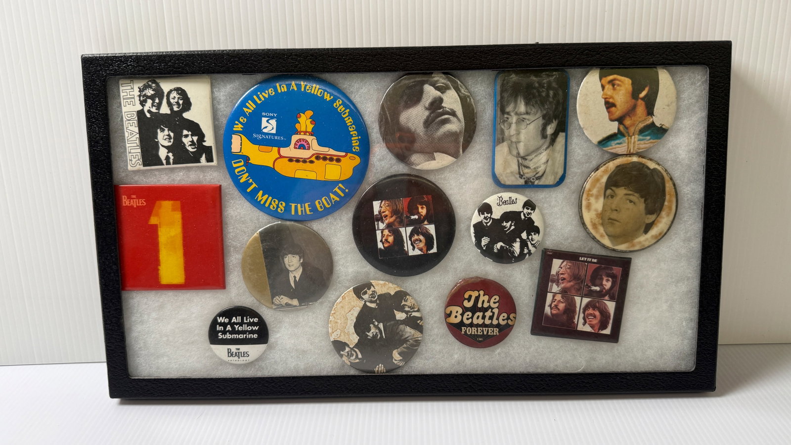 BEATLES BUTTON COLLECTION IN GLASS DISPLAY CASE (1 of 1)