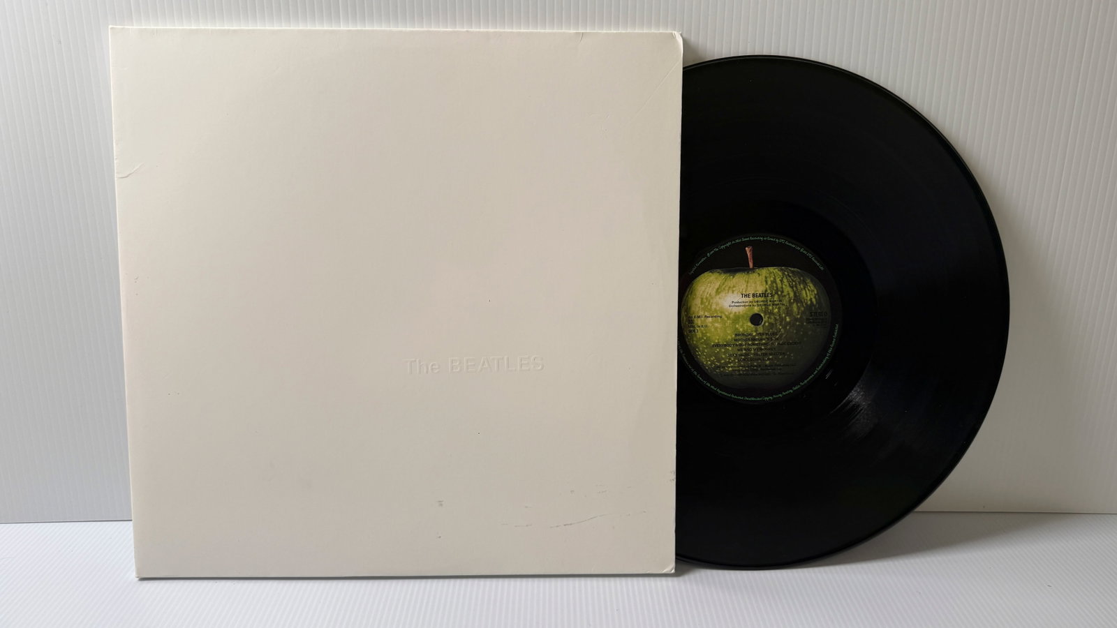 WHITE ALBUM - REISSUE - 180 GRAM - 2012: WHITE ALBUM - REISSUE - 180 GRAM - 2012. NO INSERTS. VG+. COVER SEPARATING. EMBOSSED BEATLES LOGO. NO NUMBER STAMP.