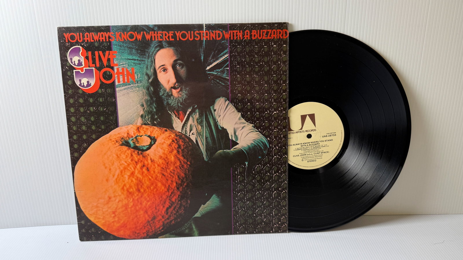 CLIVE JOHN - YOU ALWAYS KNOW WHERE YOU STAND WITH A BUZZARD: CLIVE JOHN - YOU ALWAYS KNOW WHERE YOU STAND WITH A BUZZARD. NM ALBUM BUT COVER IS SPLIT AND NEEDS RE-GLUE. 1975 ROCK