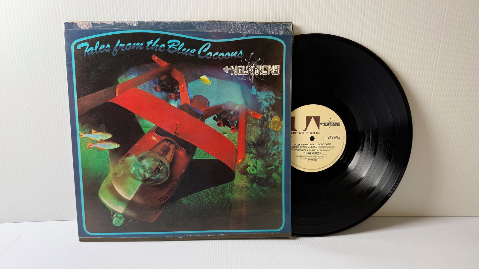 NEUTRONS - TALES FROM THE BLUE COCOONS: NEUTRONS - TALES FROM THE BLUE COCOONS. 1975 ROCK. ALBUM IS VG++++ COVER IS POOR. ($13)