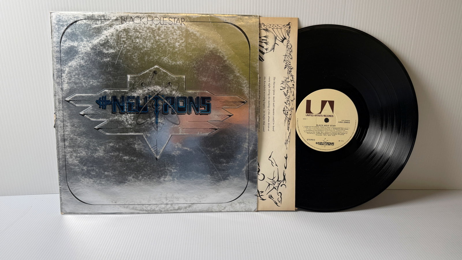 NEUTRONS - BLACK WHOLE STAR: NEUTRONS - BLACK WHOLE STAR. WITH SILVER COVER. ($11)