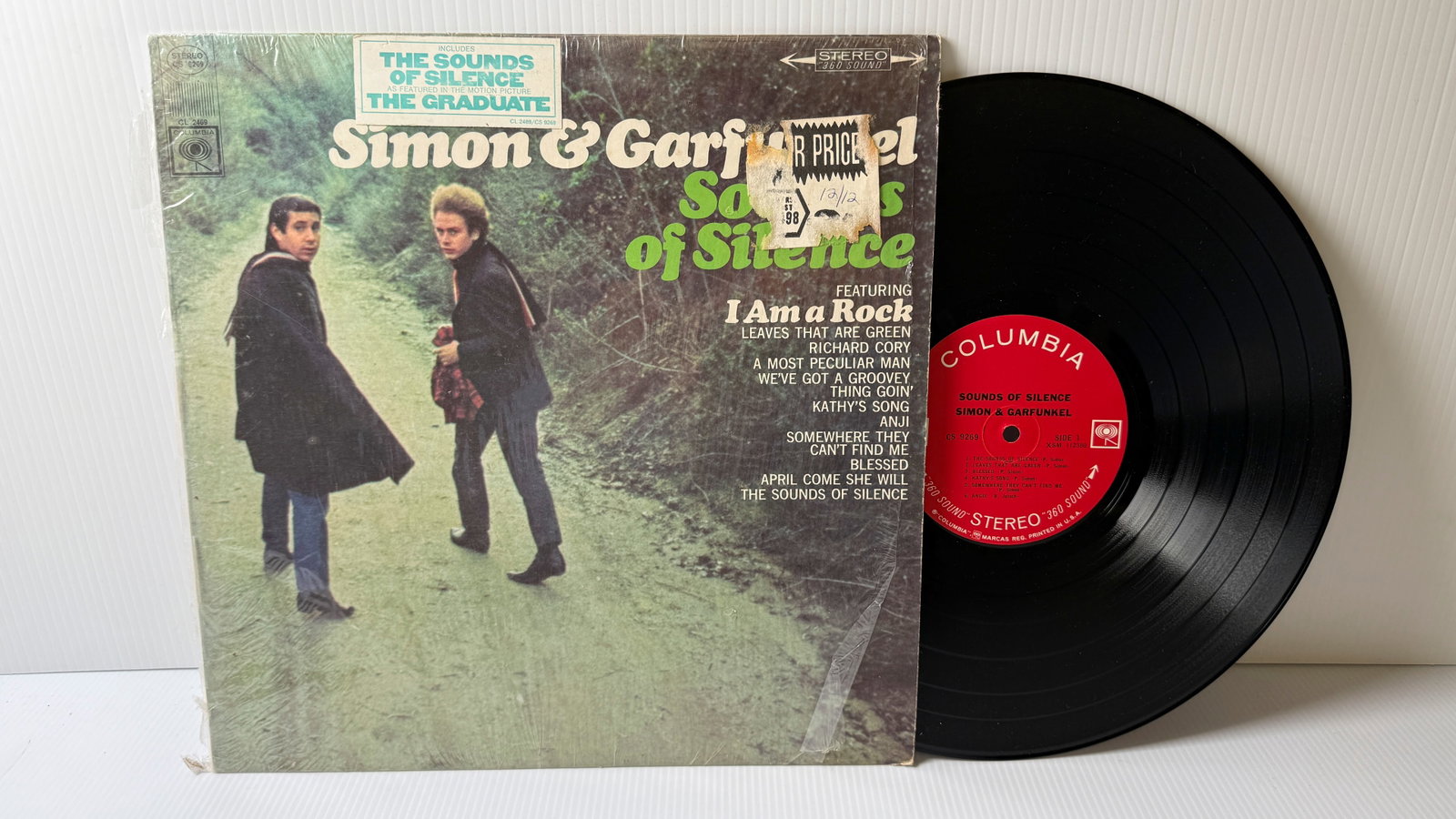 SIMON & GARFUNKEL - SOUNDS OF SILENCE - AIRBRUSHED COVER: SIMON & GARFUNKEL - SOUNDS OF SILENCE. SHRINK. HYPE STICKER. TIGER BEAT MAGAZINE IS AIRBRUSHED OUT OF COAT POCKET. ($15)