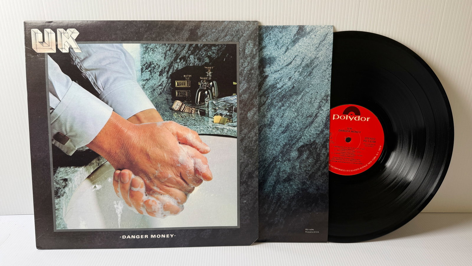 U.K. - DANGER MONEY: U.K. - DANGER MONEY. Short-lived English supergroup founded in 1977 by John Wetton, Bill Bruford (ex-King Crimson), Eddie Jobson and Allan Holdsworth. For the second and last studio album, Holdsworth