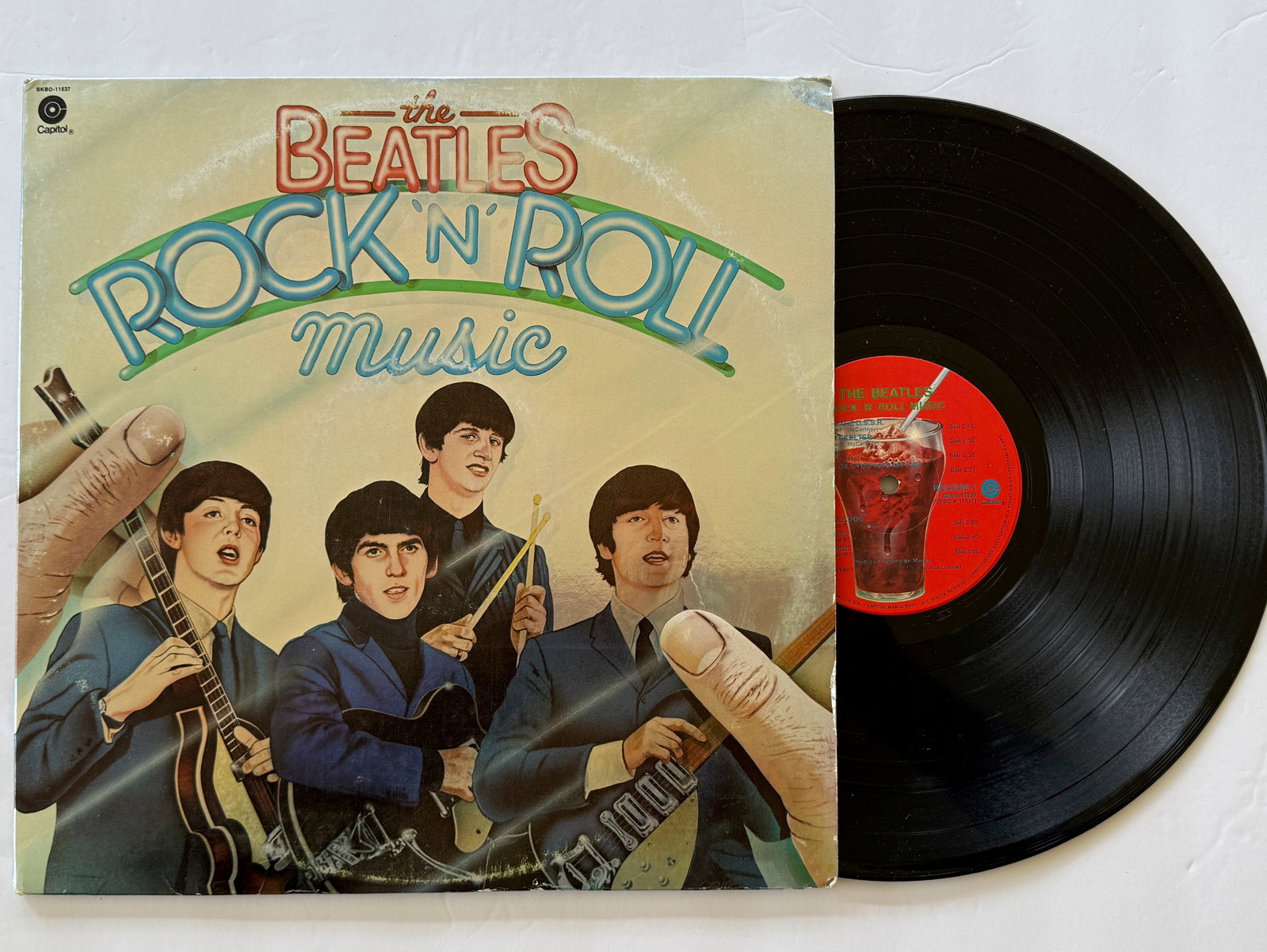 The Beatles – Rock 'N' Roll Music: The Beatles – Rock 'N' Roll Music ($20-$30). The Beatles – Rock 'N' Roll Music. Embossed Cover. 2 x vinyl. Capitol Records – SKBO-11537. 1976.