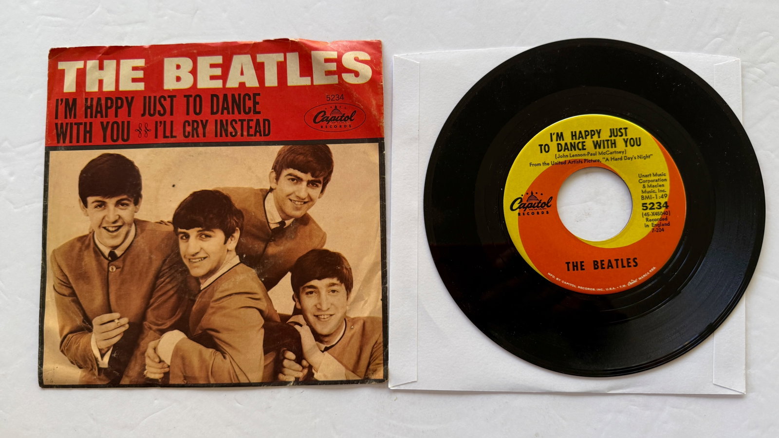 I'll Cry Instead / I'm Happy Just To Dance With You 45RPM: I'll Cry Instead / I'm Happy Just To Dance With You picture sleeve. ($30-$100).