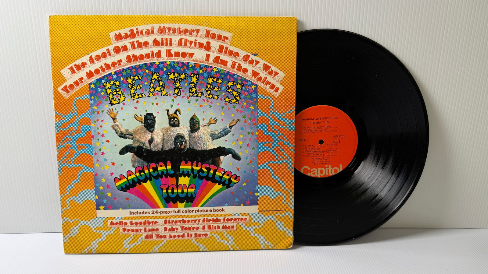 MAGICAL MYSTERY TOUR - 1976 REISSUE: MAGICAL MYSTERY TOUR - 1976 REISSUE WITH BOOKLET AND LIGHT WATER STAINS. VG++ ($16-$28)