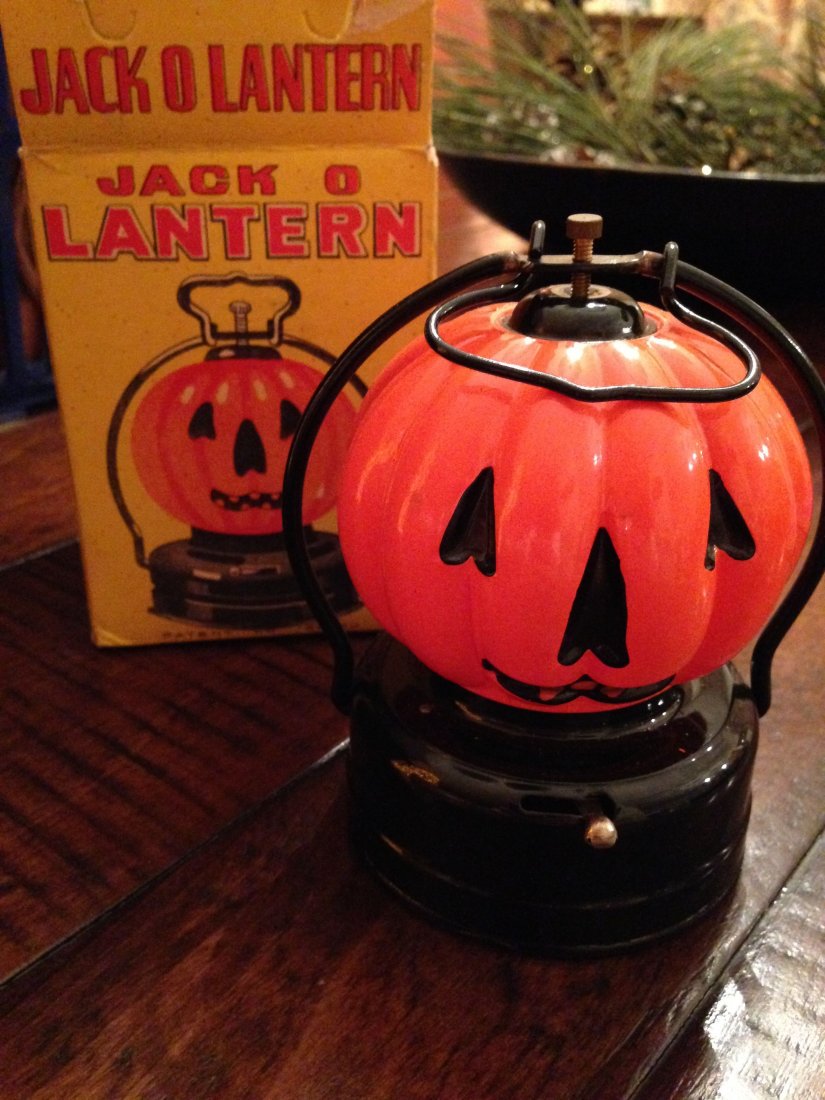 JACK O LANTERN TOY FROM JAPAN: JACK O LANTERN TOY FROM JAPAN - Marked on botton SELLS FOR .65¢ ! - Pumpkin shape with blinker. Box and toy are in near mint condition. 70's.