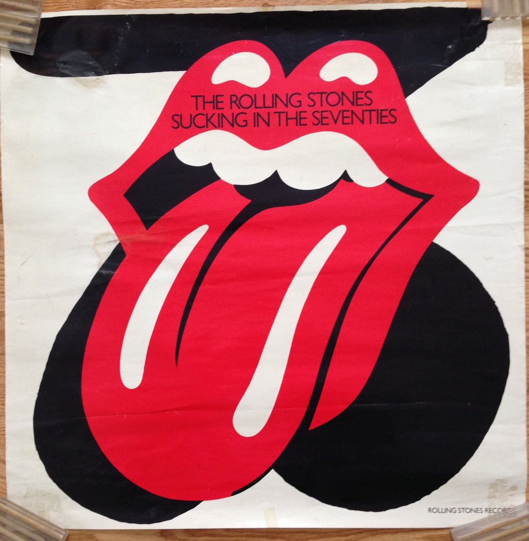 Rolling Stones iconic tongue and lips CUT OUT poster: Rolling Stones Sucking In The Seventies promo poster. - Recording company promo poster. Not available to general public. - 24x24 - age marks and holes - iconic tongue and lips in a die-cut poster.