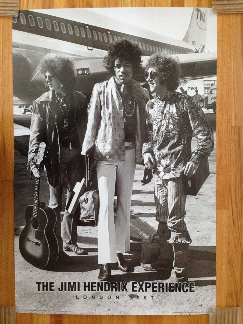JIMI HENDRIX EXPERIENCE LONDON 1967: JIMI HENDRIX EXPERIENCE LONDON 1967. Landing at TWA Terminal. Mint. 24â€ x 36â€. Photo by Henry Diltz.